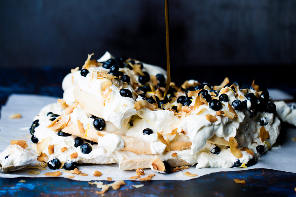 Keto Pavlova with Blueberries, Cream and Toasted Coconut